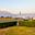 Mt Meru as seen from Arusha Airport with small aircraft and runway in foreground