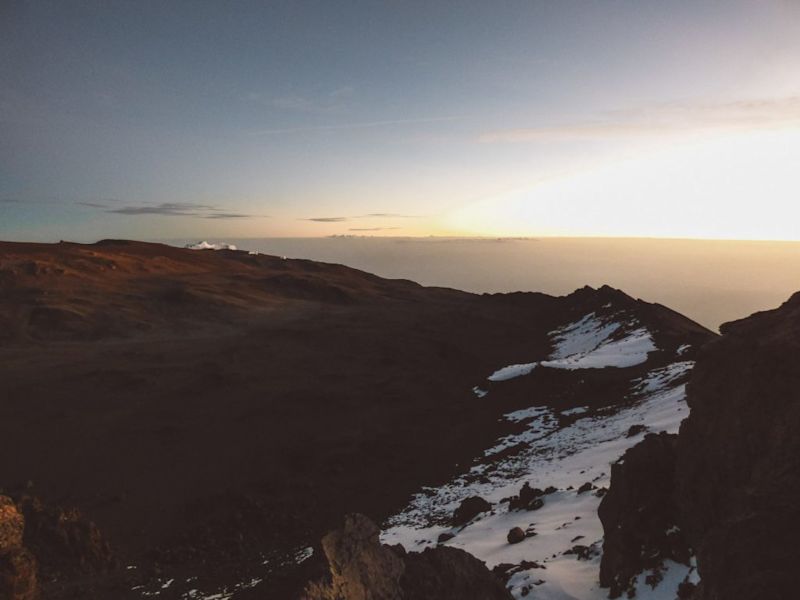 Snow on summit of Kilimanjaro at sunrise, Kilimanjaro safety