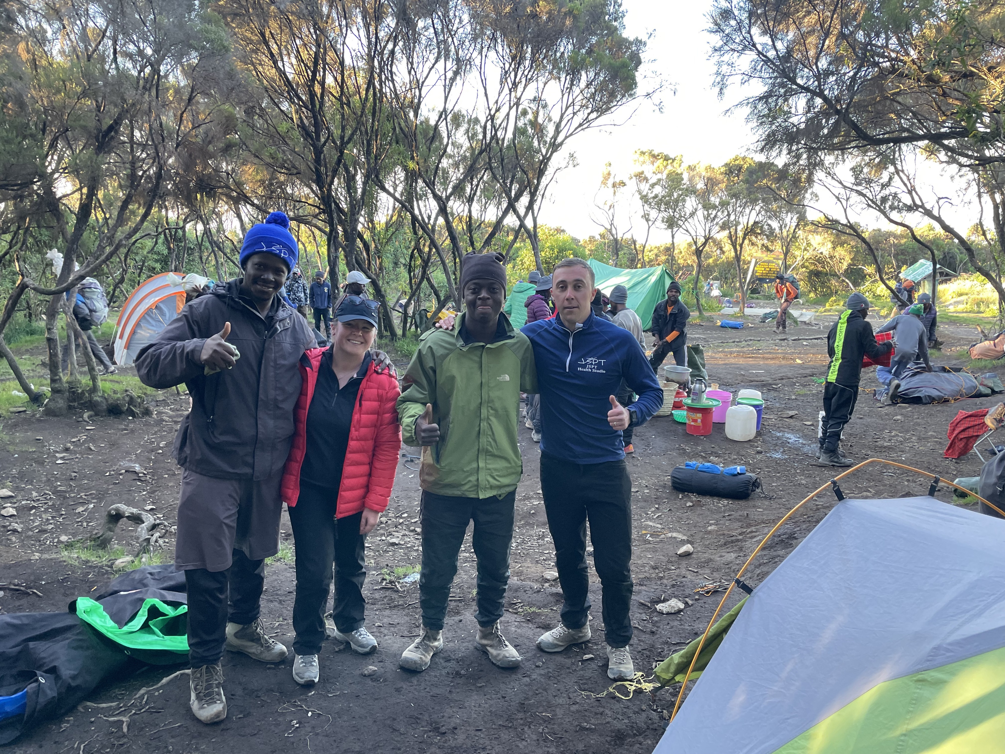 Smiling men and woman at Mweka Camp on Kilimanjaro