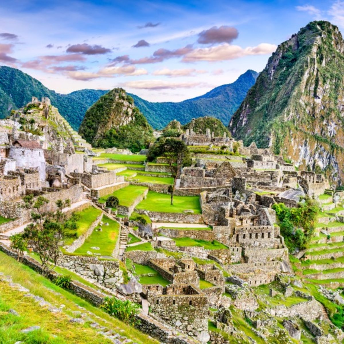 Machu Picchu in Peru - Ruins of Inca Empire city and Huaynapicchu Mountain in Sacred Valley, Cusco