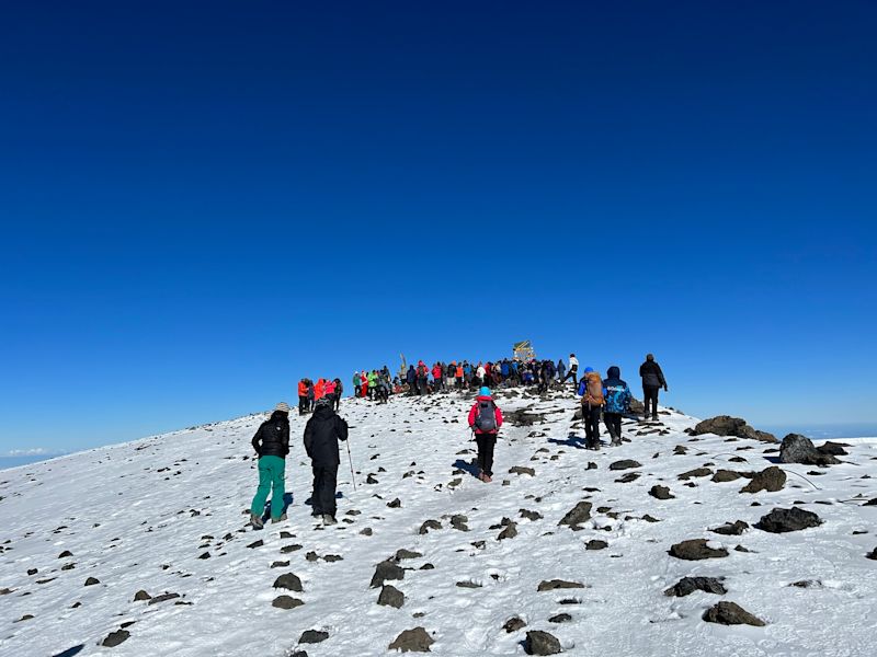 Crowds nearing Uhuru Peak on Kilimanjaro on 1 January 2023