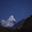 Ama Dablam under a starry night sky