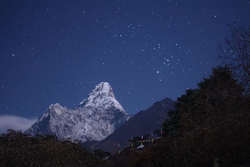 Ama Dablam under a starry night sky