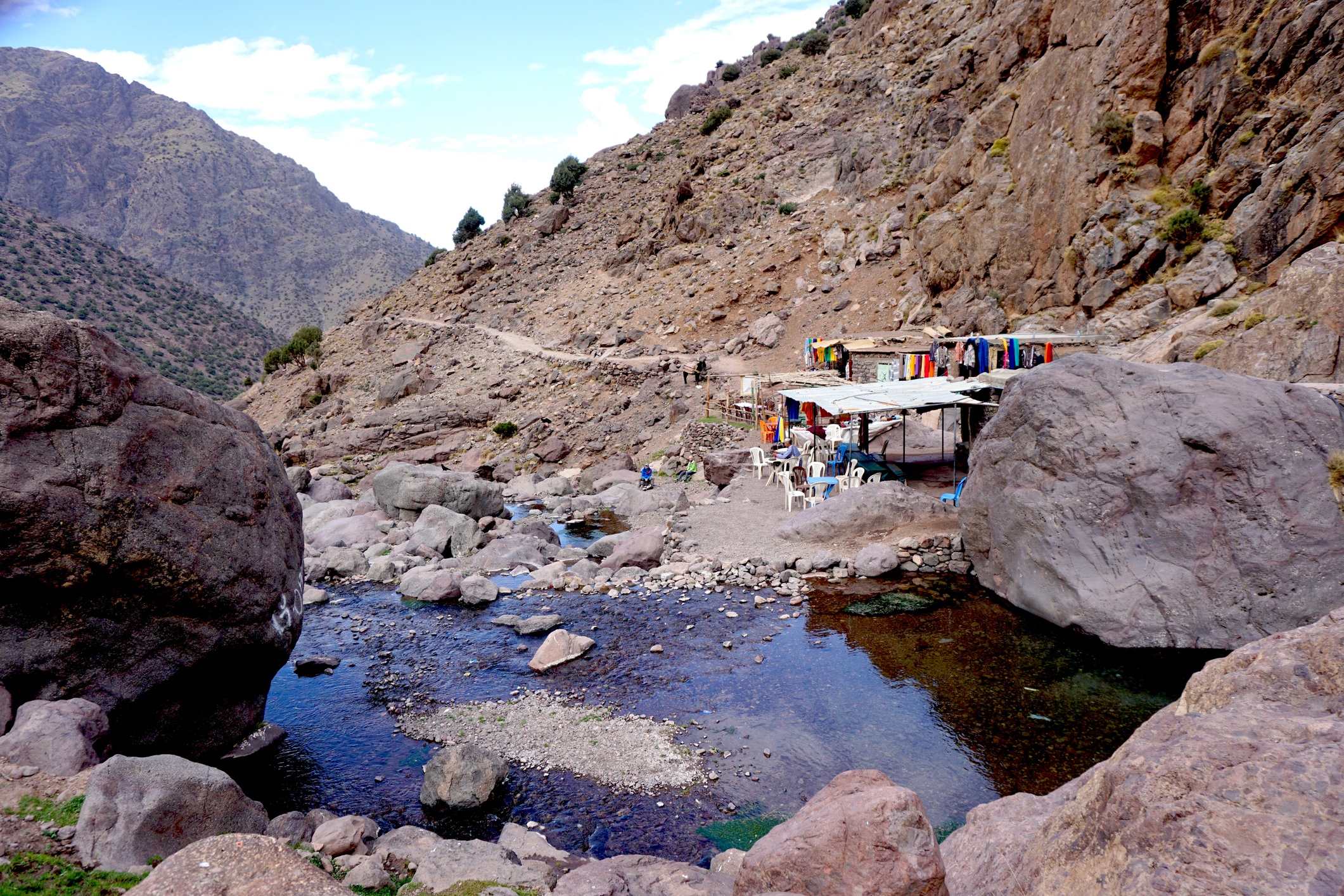 Outdoors cafe with chairs on trek route up Mount Toubkal, peak, trekking, Morocco, hiking trip to mount Toubkal, Africa