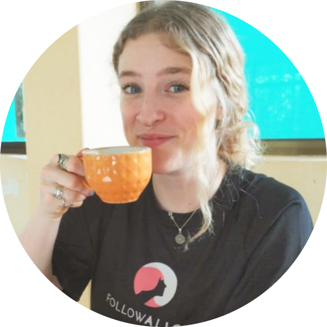 Tash drinking coffee