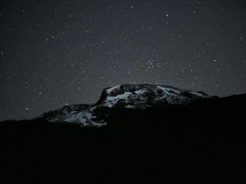 Starry sky and view of Uhuru from Barranco Camp on Kilimanjaro 