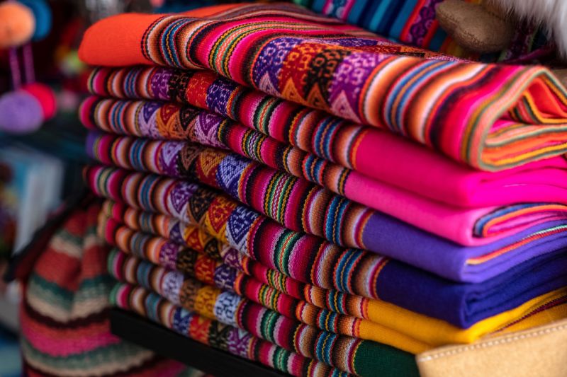 Colourful Peruvian artisanal textiles cloth with Inca and traditional patterns for sale at street in Miraflores, Lima, Peru 