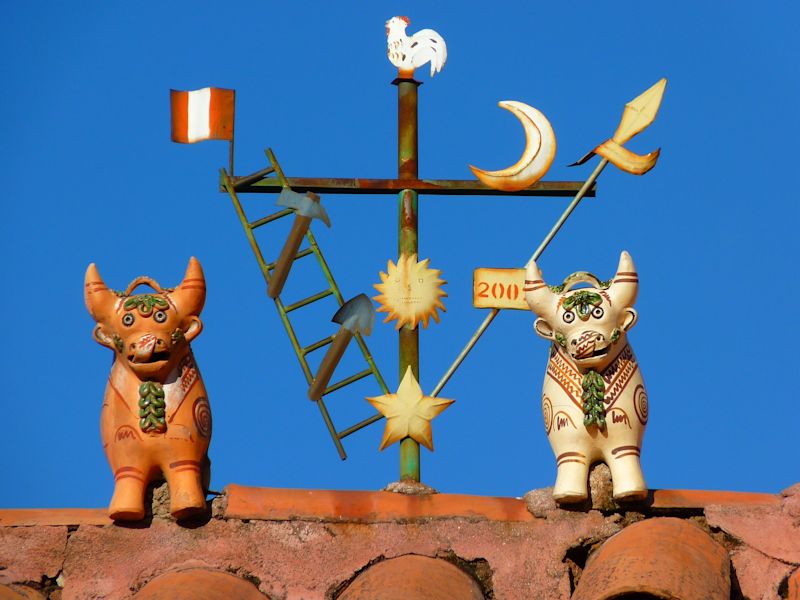 Weather vane and ornaments on a house in Cusco, Peru, Inca Trail