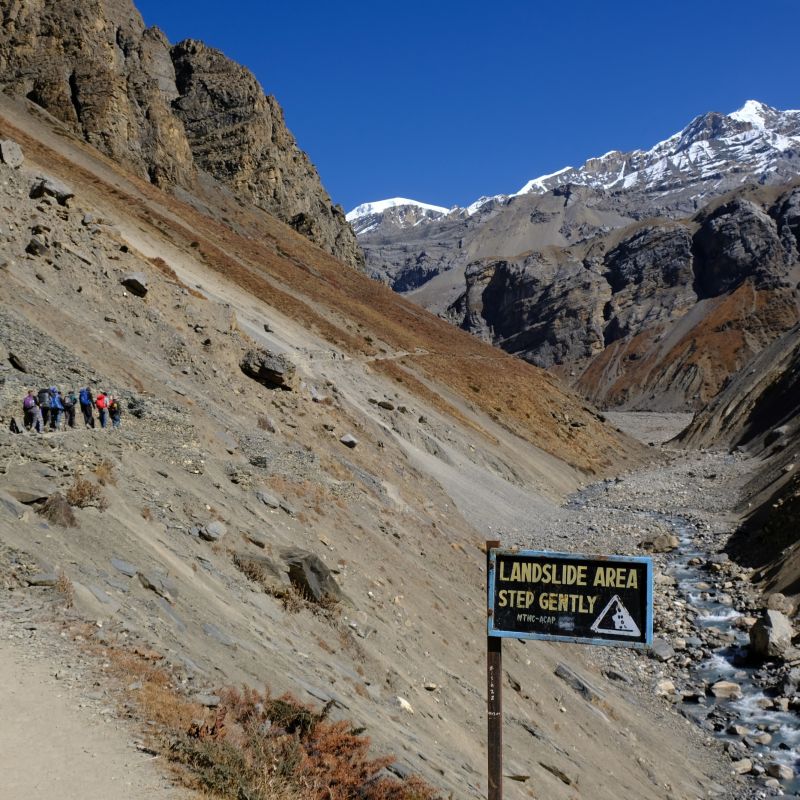 Pur. Trekkers on path between Yak Kharka and Thorung Phedi, Annapurna trek