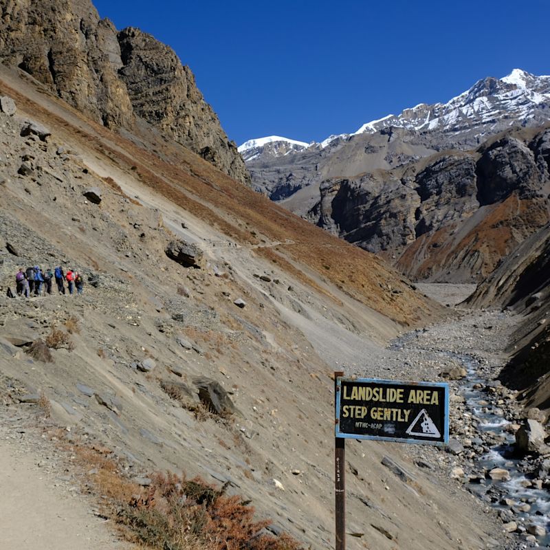 Pur. Trekkers on path between Yak Kharka and Thorung Phedi, Annapurna trek