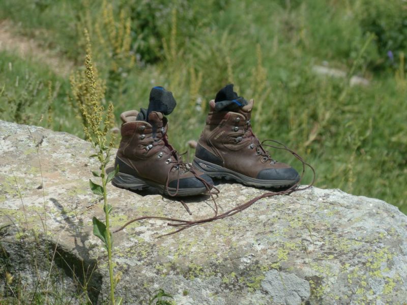 Leather hiking boots on a rock, best hiking boots for Kilimanjaro