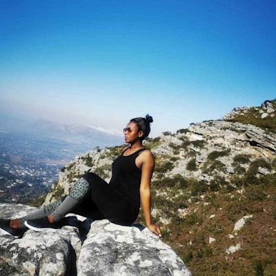 Lady on a rock on Table Mountain