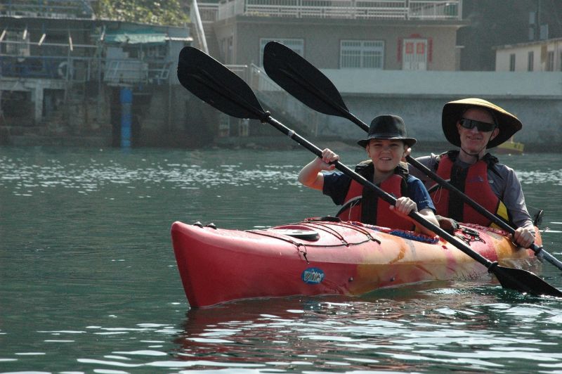 Father and son sea kayaking
