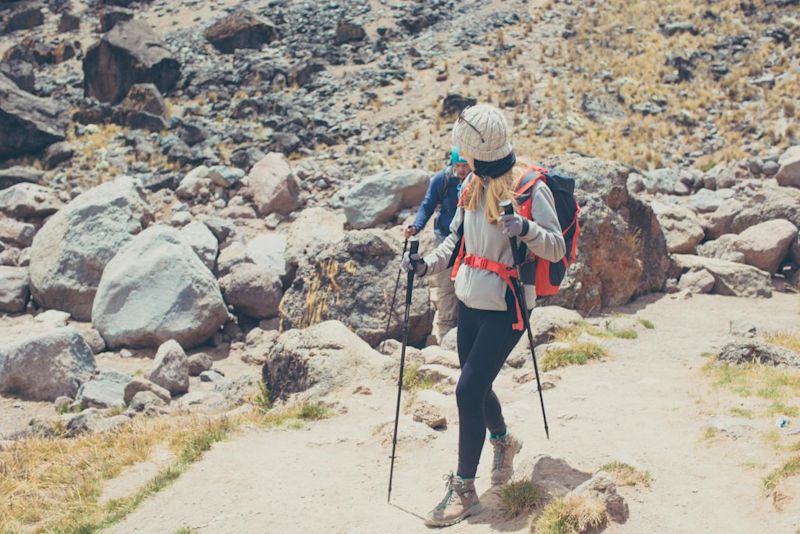 Lady with trekking poles